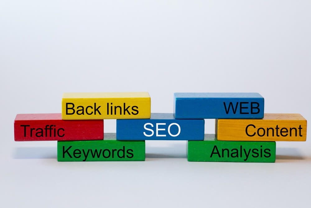 seo_colorful blocks with the words: SEO, WEB. Content, Analyses, Keywords, Traffic, Back links, are isolated against a white background with space for text