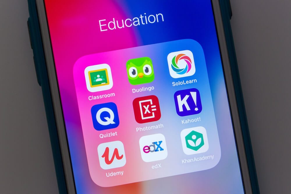 duolingo_Kumamoto / JAPAN - Oct 3 2020 : Close up popular education apps / services (Classroom, Duolingo, SoloLearn, Quizlet, Photomath, Kahoot!, Udemy, edX and Khan Academy) on iPhone screen