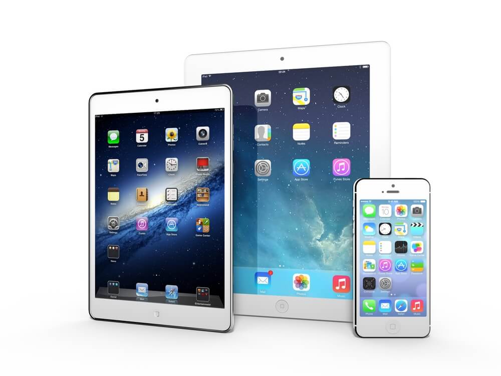 iphone ipad_AMSTERDAM, THE NETHERLANDS, CIRCA APRIL 2014 - Three Apple iOS devices on display: iPad 3, iPad Mini and iPhone 5s.