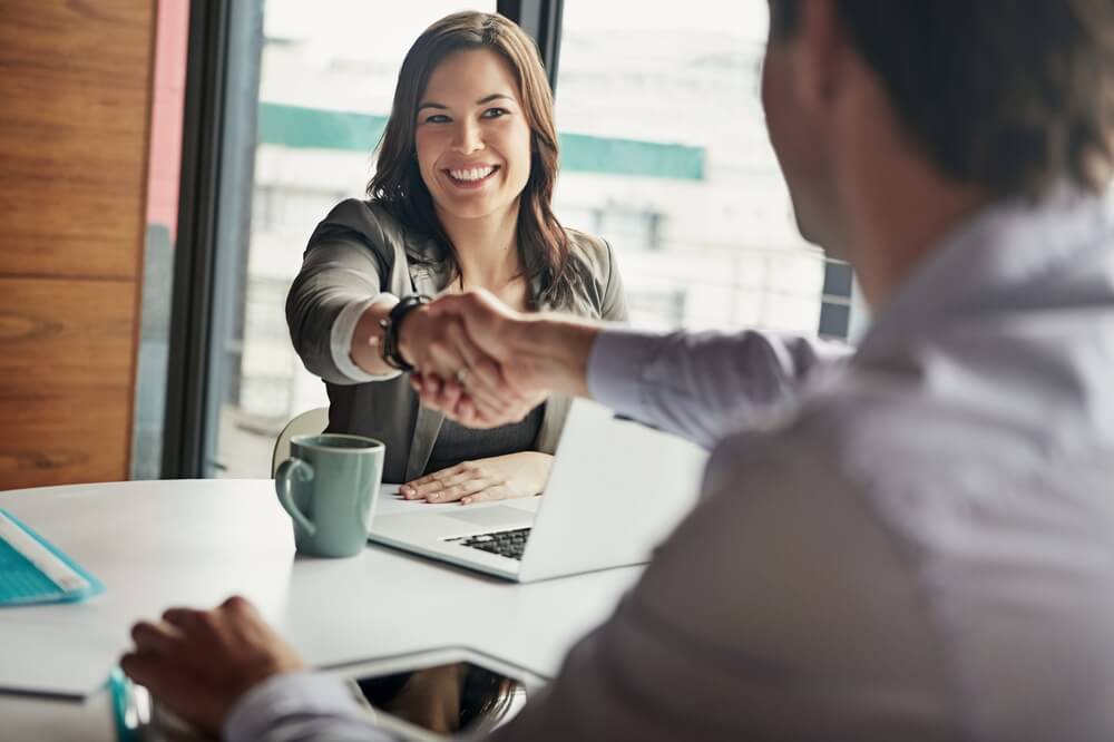 b2b partner_Business people, handshake and welcome for tech meeting, partnership deal and employee collaboration. Hello, thank you and corporate workers shaking hands for teamwork, onboarding or b2b interview