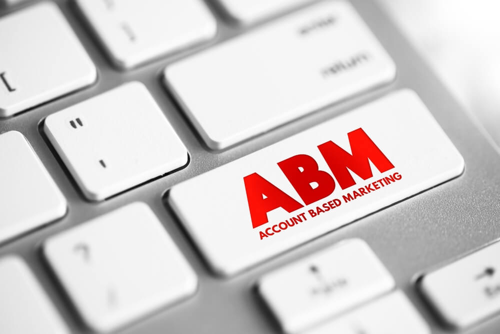 account based marketing_ABM Account Based Marketing - business marketing strategy that concentrates resources on a set of target accounts within a market, text concept button on keyboard
