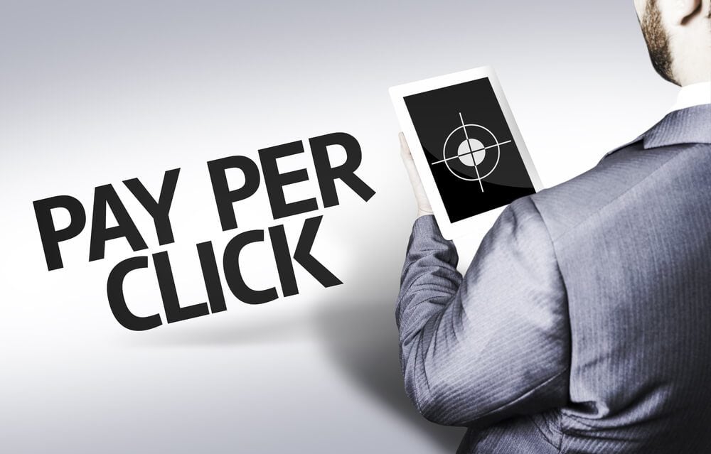 pay per click_Business man with the text Pay Per Click in a concept image