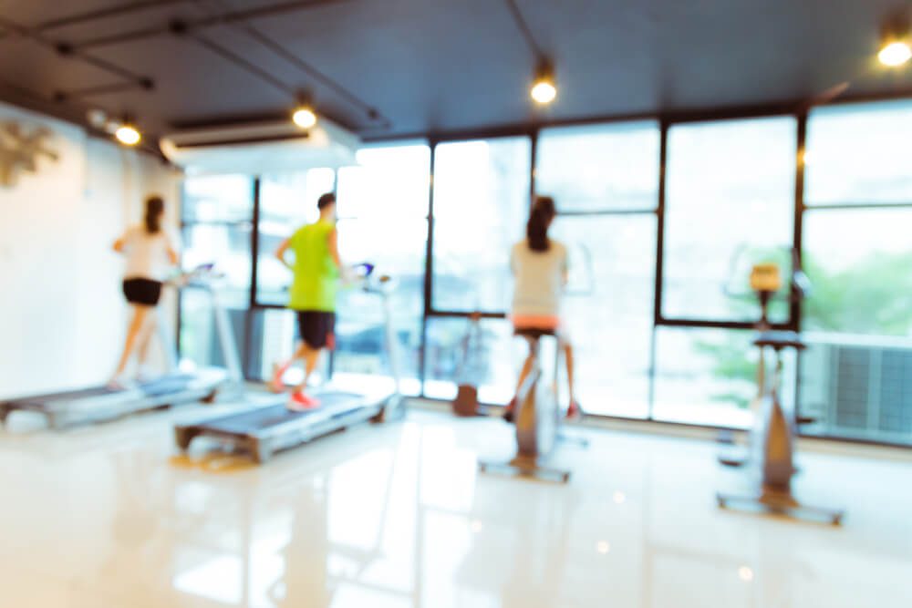 fitness center_Abstract blur Modern fitness center with people, fitness gym background