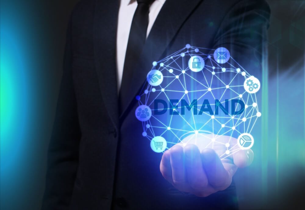 demand_Business, Technology, Internet and network concept. Young businessman working on a virtual screen of the future and sees the inscription: Demand