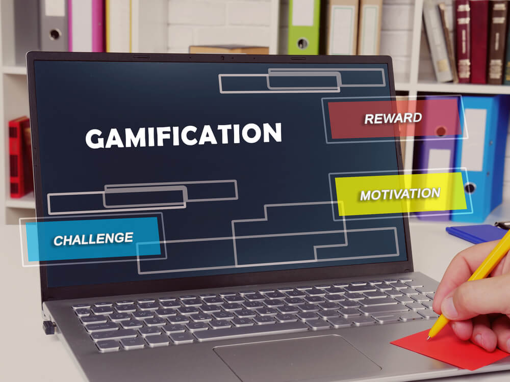 ecommerce gamification and rewards_Business concept meaning gamification reward motivation challenge with inscription on the sheet.