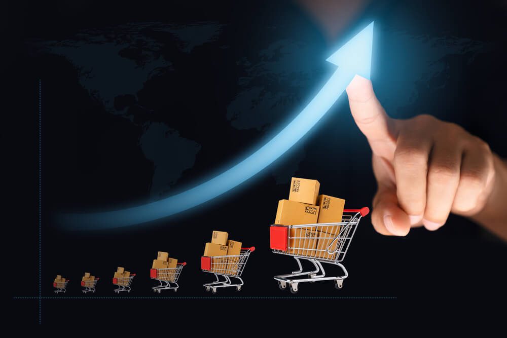 ecommerce boost sales_Online shop growing concept, ecommerce marketplace, Web online shopping and delivering, Finger pointing at arrow and shopping cart