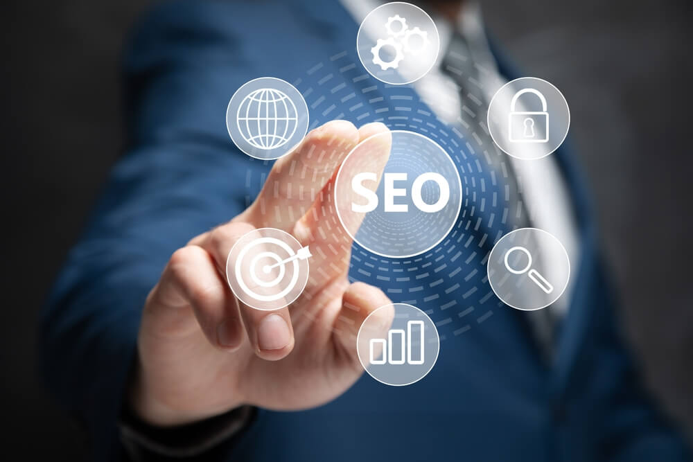 local SEO_SEO and icons on virtual screen. Man tapping on the screen