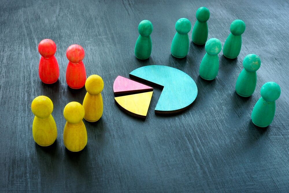 niche market_Customer segmentation concept. Color figurines and charts as symbol of market.