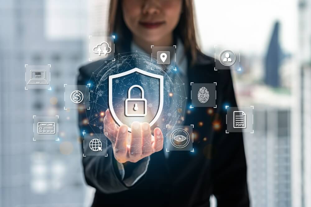 cyber security_Businesswoman using smart devices with global network connection and cyber security business data protection technology