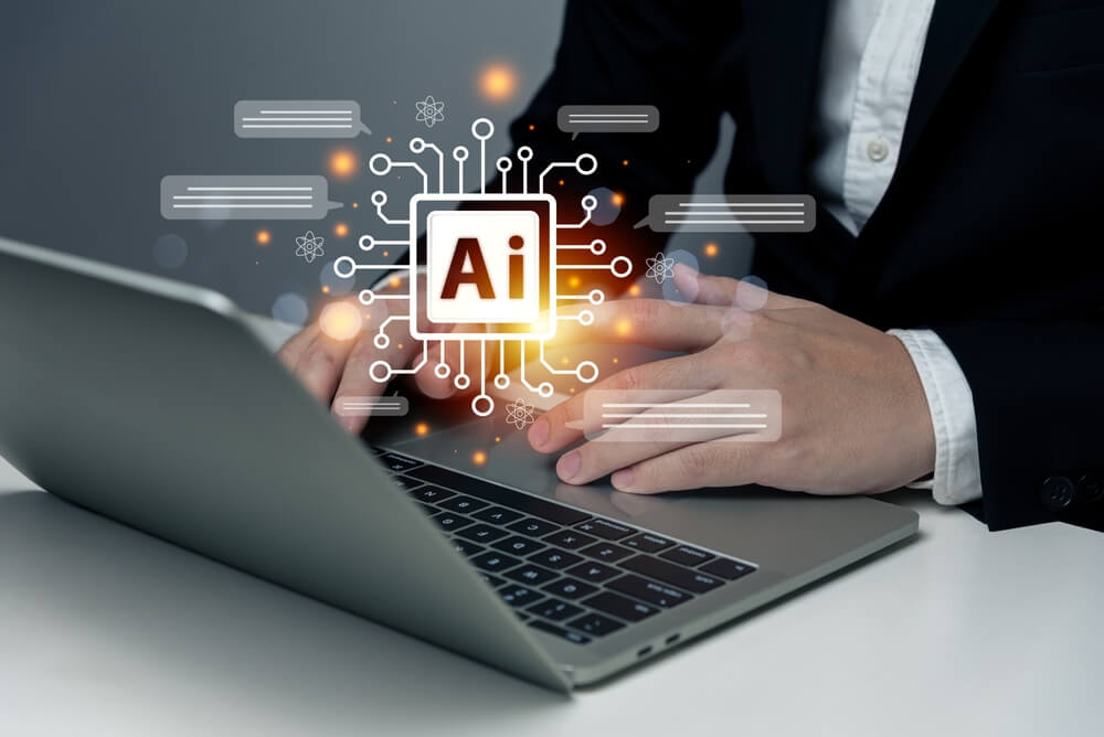 AI SEO_Businessman using laptop chat with AI tech concept, connecting smart robot AI, enter command prompt for generate idea, prompt engineering, futuristic technology transformation, solve problem, SEO.