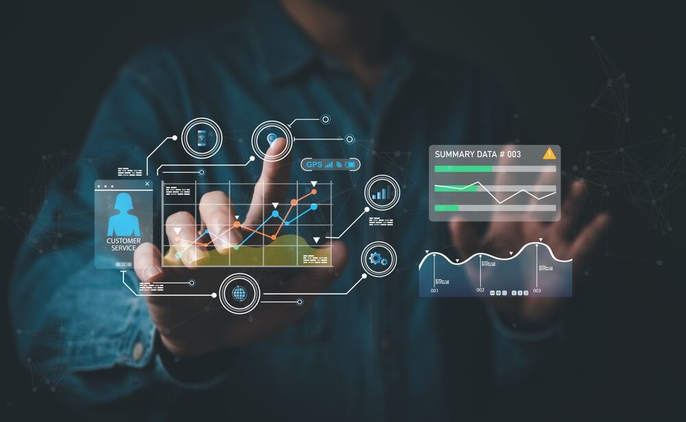 data analysis_young entrepreneur using big data analysis and cloud technology to collect customer data and display on application dashboard from digital tablet to understand sale forecast and marketing plan.