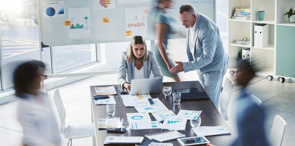 B2B demand generation_Presentation, marketing and sales b2b strategy of teamwork, collaboration or planning. Blurred motion of busy corporate advertising team with laptop, logistics and business sale analytics to audience