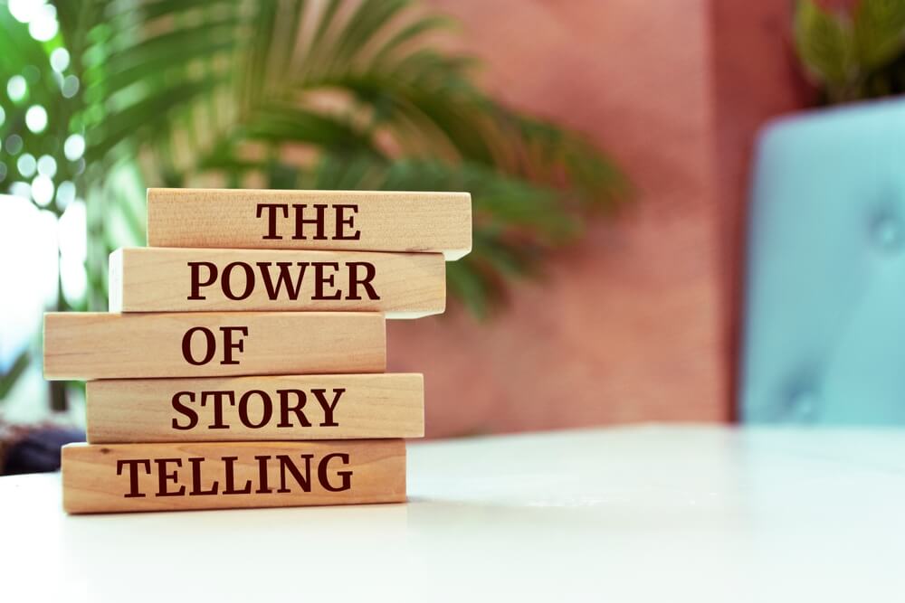 storytelling_Wooden blocks with words 'THE POWER OF STORYTELLING'.
