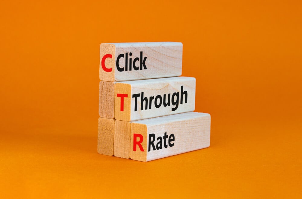 CTR_CTR click through rate symbol. Wooden blocks with words 'CTR click through rate'. Beautiful orange background. Business and CTR click through rate concept. Copy space.