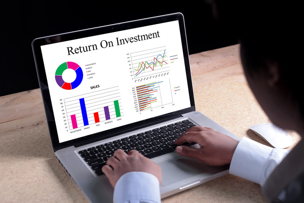 ROI_Return On Investment chart on laptop screen. Business, banking, finance and investment concept.