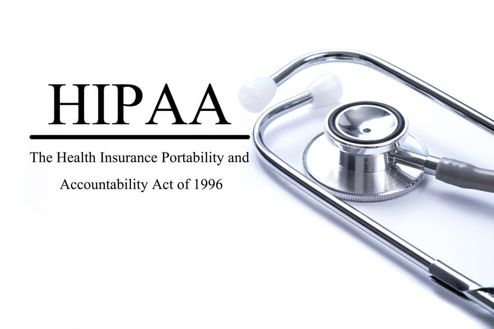 HIPAA_Page with HIPAA (The Health Insurance Portability and Accountability Act of 1996) on the table with stethoscope, medical concept
