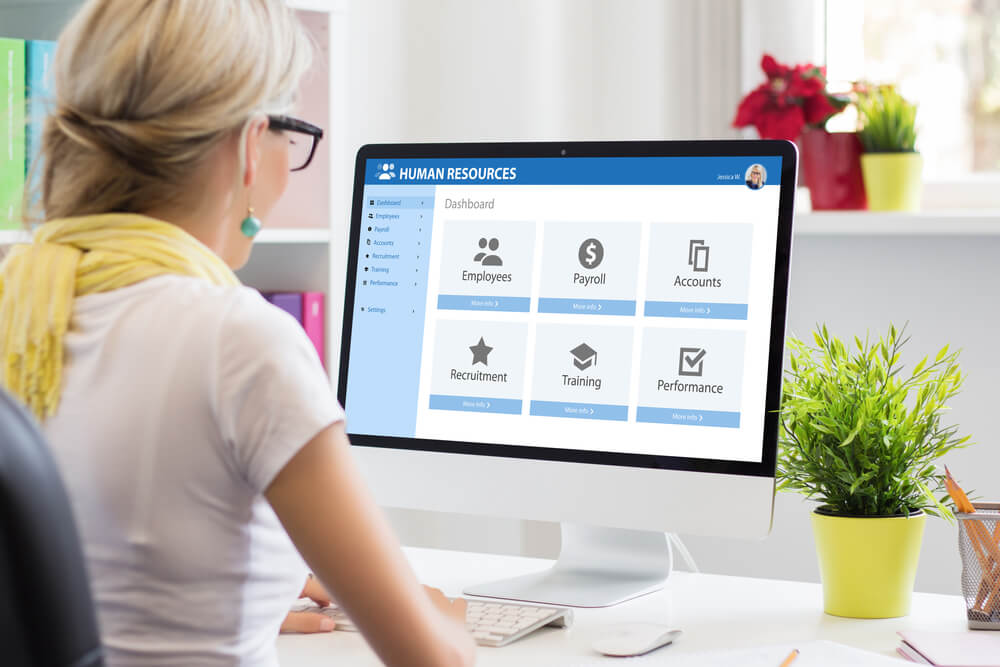 HR apps_Woman working with human resources software on computer