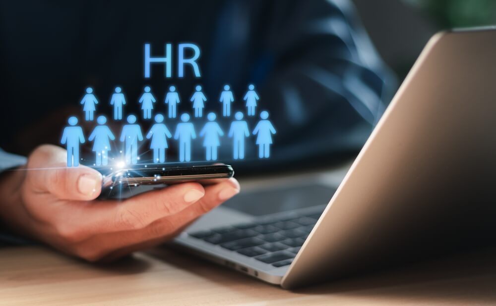 HR_Modern online technology to simplify HR systems. Human Resources (HR) management concept. People analytics, HR, recruitment, leadership and teambuilding.