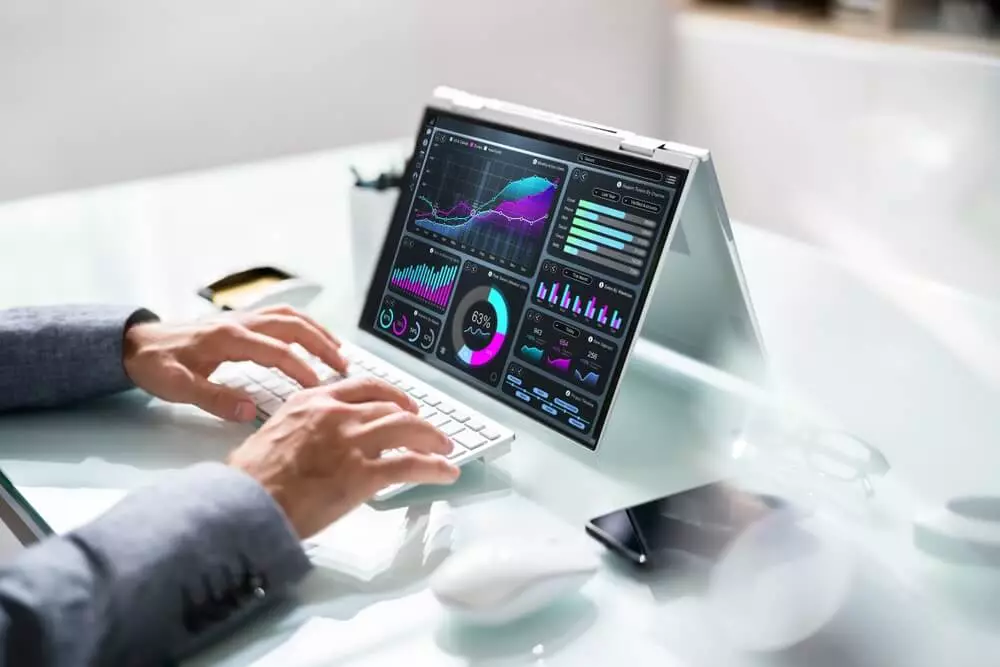 data analytics_Businessman Using Analytics Data KPI Dashboard Tech