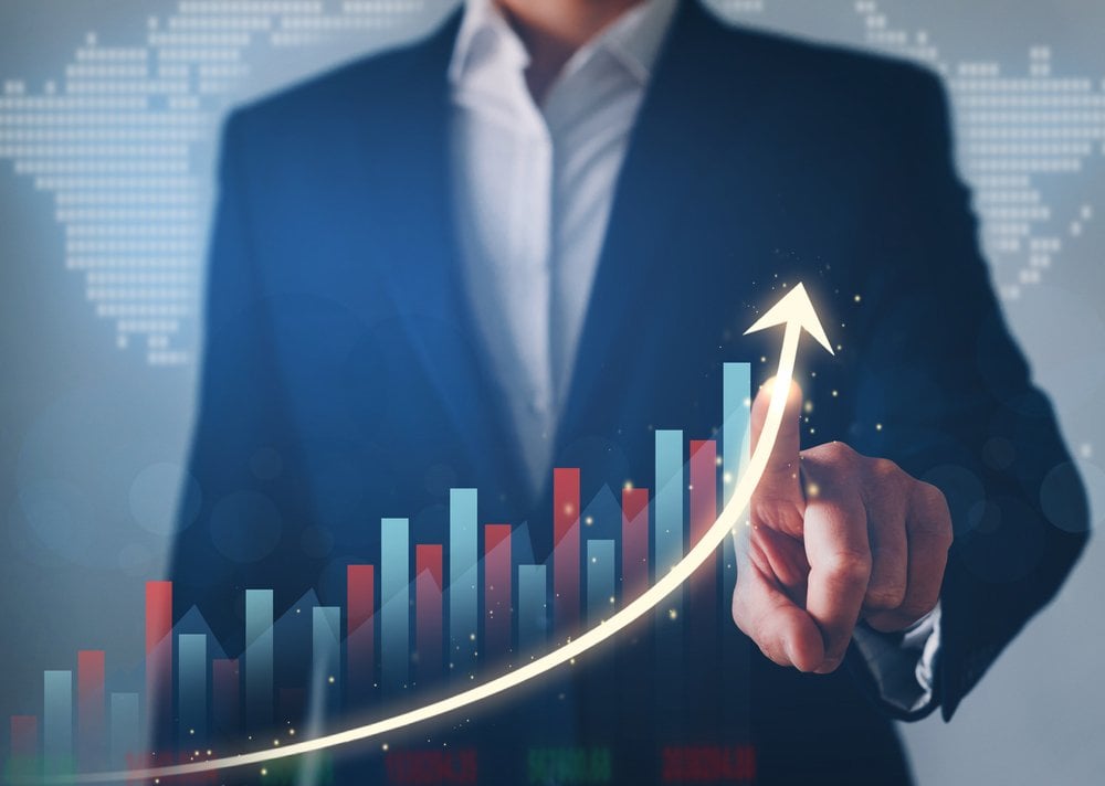Business development to success, profit and growing plan. Businessman finger pointing increase arrow graph chart.