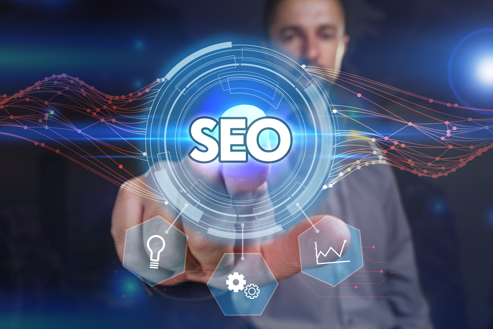 Business, Technology, Internet and network concept. Young business man chooses the virtual screen: SEO
