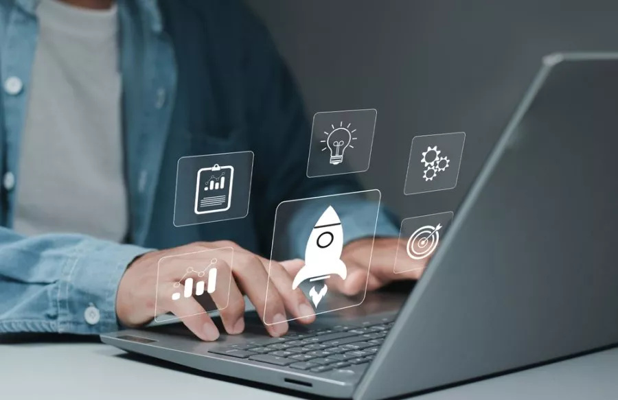 Businessman showing startup business idea Network connection icon on modern virtual interface rocket. idea, growth, digital, technology, concept, unicorn, company, future, success, global