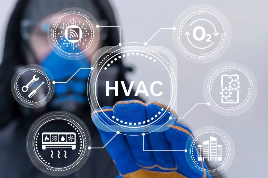 Worker using virtual touch screen presses abbreviation: HVAC. HVAC concept of Heating Ventilation Air Conditioning. Industrial and Home Air Conditioning Cooling Systems Repair Service.